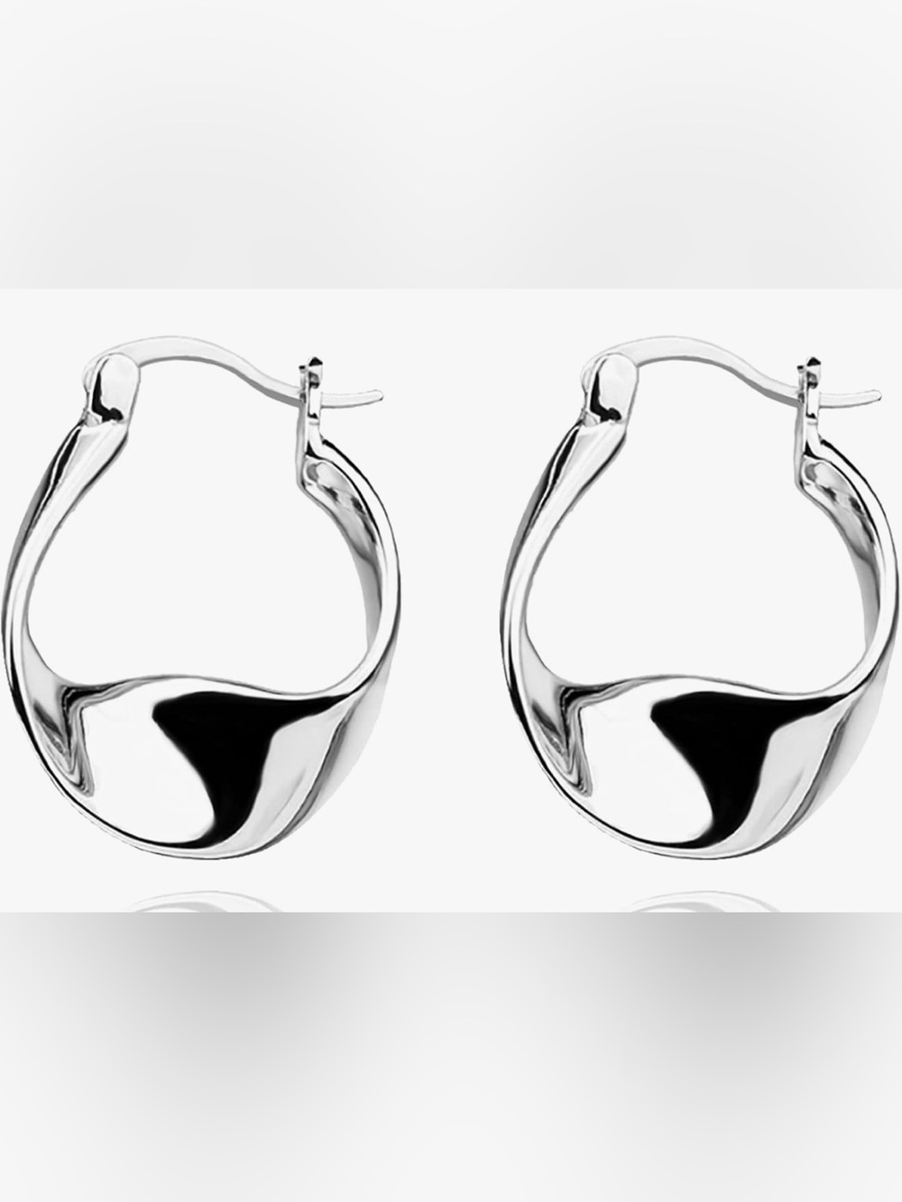 Unique Neiman Marcus Sterling Silver Wavy Hoop earrings